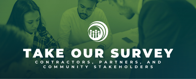 Four adults seated around a table